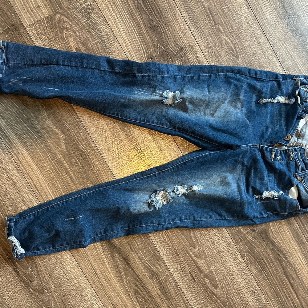 Distressed Blue Jeans